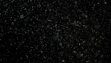 Slow-Motion-Snow-on-Black-Background