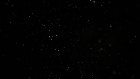 Slow-Motion-Snow-on-Black-Background