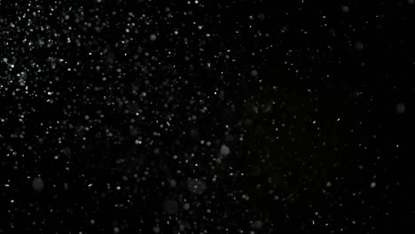 Slow-Motion-Snow-on-Black-Background