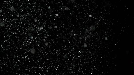 Slow-Motion-Snow-on-Black-Background