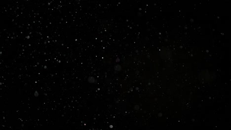 Slow-Motion-Snow-on-Black-Background