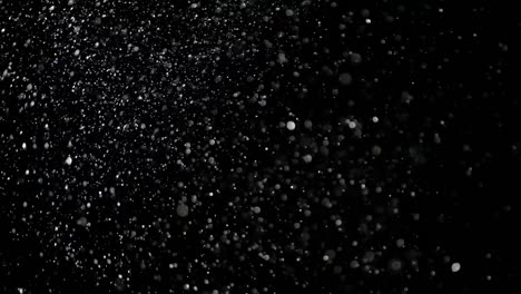 Slow-Motion-Snow-on-Black-Background