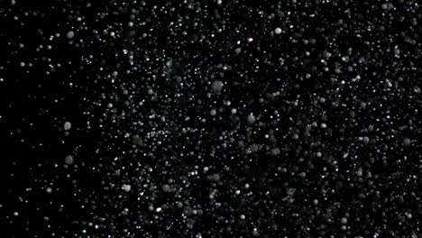 Slow-Motion-Snow-on-Black-Background