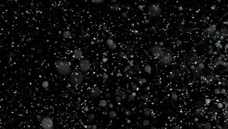 Slow-Motion-Snow-on-Black-Background