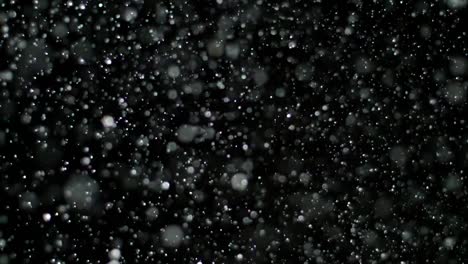 Slow-Motion-Snow-on-Black-Background