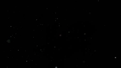 Slow-Motion-Snow-on-Black-Background