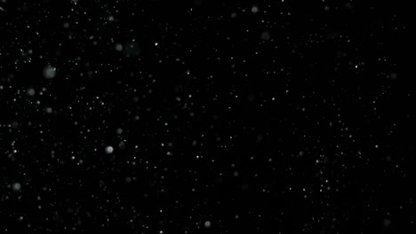 Slow-Motion-Snow-on-Black-Background