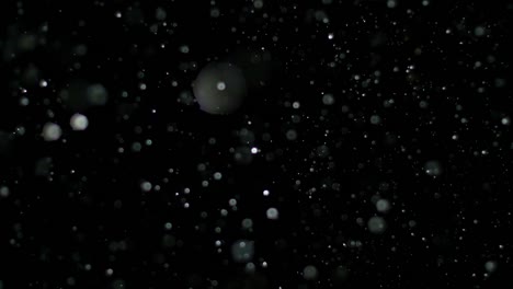 Slow-Motion-Snow-on-Black-Background