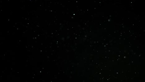 Slow-Motion-Snow-on-Black-Background