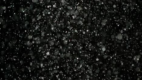 Slow-Motion-Snow-on-Black-Background