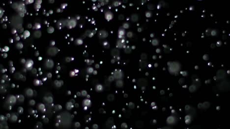 Slow-Motion-Snow-on-Black-Background