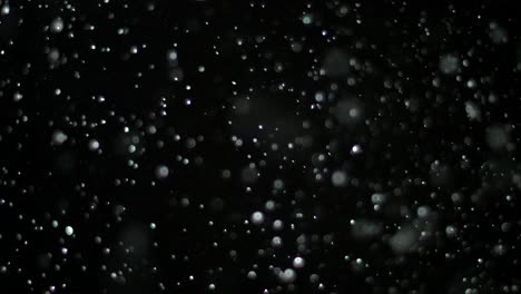 Slow-Motion-Snow-on-Black-Background