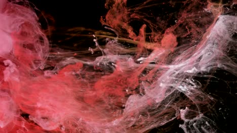 Red-And-White-Ink-Paints-Colors-in-Water-Creating-Shapes