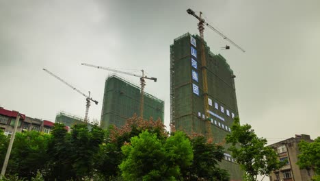 wuhan-city-day-time-apartment-buildings-construction-panorama-4k-time-lapse-china