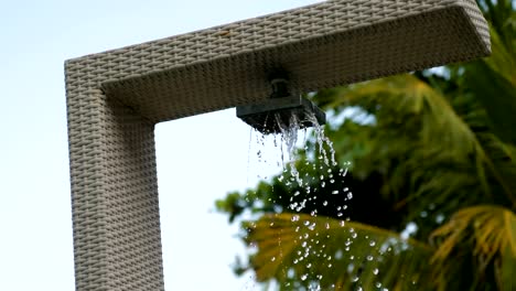 Shower-on-the-beach-with-running-water