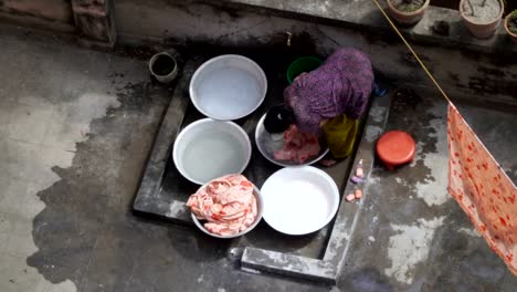 Woman-washing-clothes