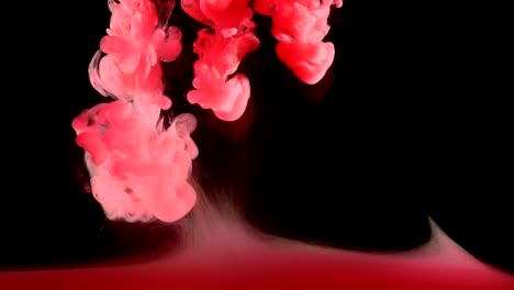 Red-Ink-Paint-in-Water-Creating-Liquid-Artistic-Shapes