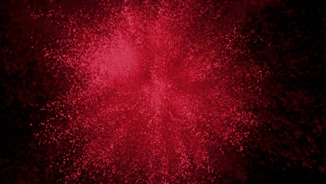 Red-powder-exploding-on-black-background-in-super-slow-motion