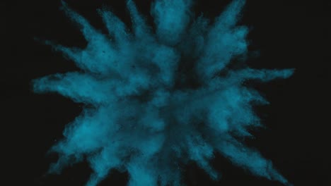 Blue-Green-powder-exploding-on-black-background-in-super-slow-motion