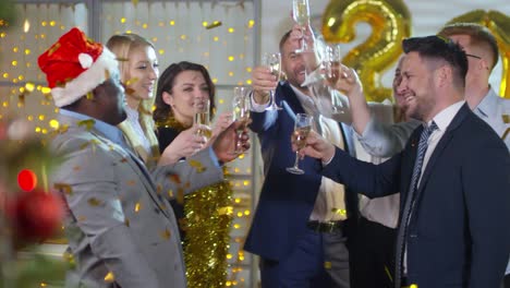 Businesspeople-Clinking-Glasses-at-New-Years-Party