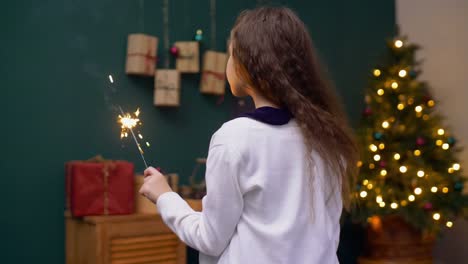 Happy-kid-enjoying-the-fire-sparks-of-bengal-light