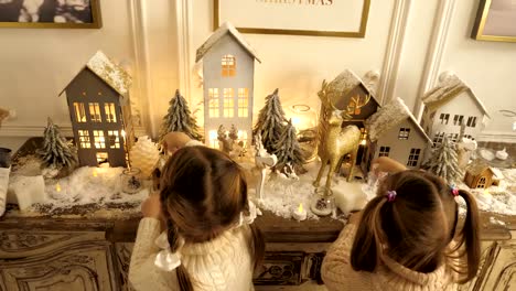 Happy-llittle-pretty-girls-with-Christmas-and-New-Year-toys-and-decorations