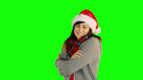 Woman-in-santa-hat-blowing-over-hands