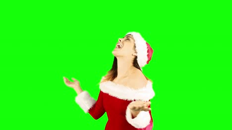 Joyful-santa-girl-looking-up-and-smiling-at-camera