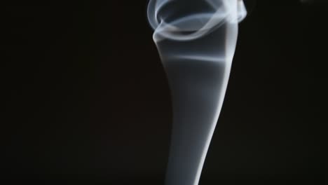 SLOW-MOTION:-Elegant-line-of-smoke-on-a-black-background