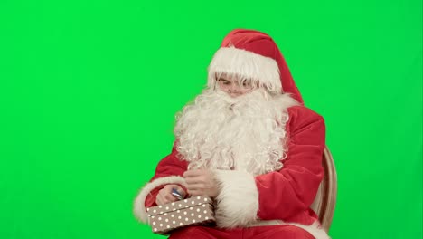 Santa-Claus:-regalos-alegres-en-una-pantalla-verde-Chrome-Key