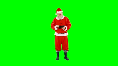 Santa-claus-using-digital-tablet