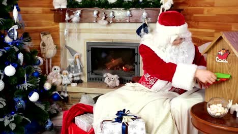 santa-reading-letters,-saint-nicolas-after-work-at-his-winter-residence,-christmas-preparation