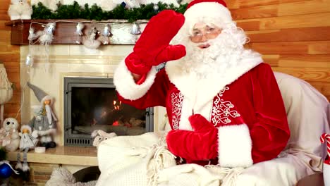 santa-greeting-visitors,-hospitable-santa-claus,-saint-nicolas-welcomes-kids-to-visit-him