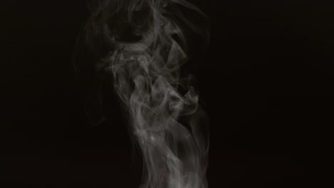 Steam-on-black-background-in-slow-motion