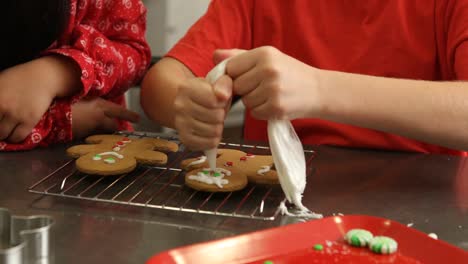 Decorating-gingerbread-men-for-Christmas