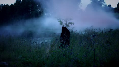 4K-Halloween-Horror-Man-with-Black-Cape-in-Smoke