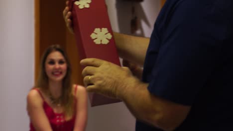 Brazilian-Family-on-the-living-room-exchanging-christmas-presents---Amigo-Secreto