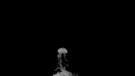 Smoke-billowing-over-a-black-background.