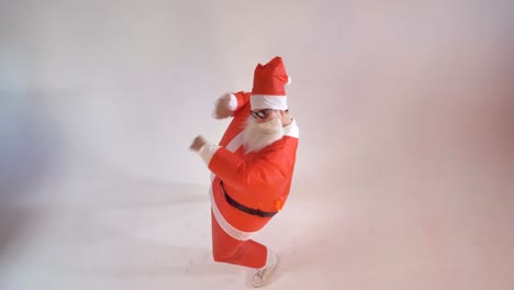 Santa-Claus-artist-wants-the-viewer-to-join-party-dance.