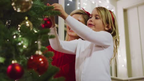 Mother-and-Daughter-Decorating-Christmas-Tree