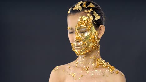 Gold-Leaf-High-fashion-style-on-Asian-Woman-Face-dark-mystery-look