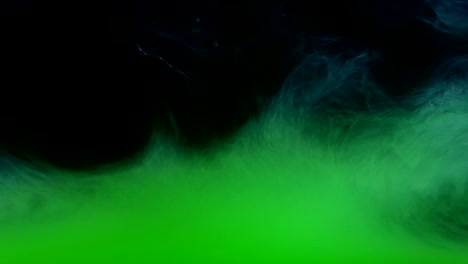 Green-Ink-Colors-in-Water-Creating-Liquid-Art-Shapes