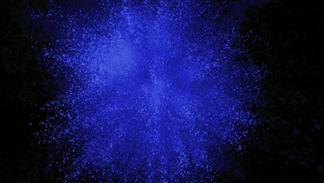 Polvo-azul-explosión-sobre-fondo-negro-en-camara-super-lenta