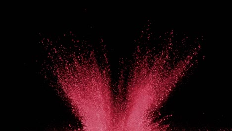 Red-powder-exploding-on-black-background-in-super-slow-motion