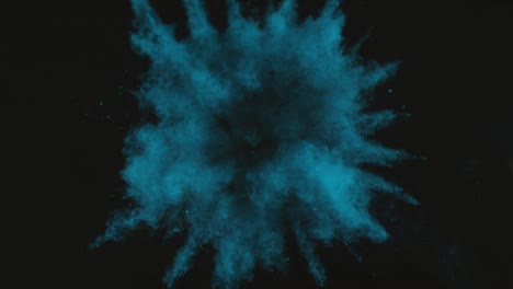 Blue-Green-powder-exploding-on-black-background-in-super-slow-motion