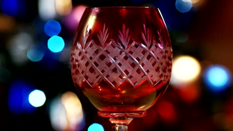 Red-Wine-Glass-with-bokeh-Lights-in-the-background