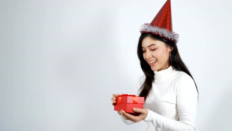 woman-open-christmas-gift-box-on-a-white-background