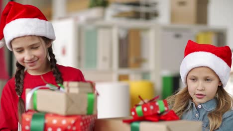 Joyous-Little-Girls-Discussing-Christmas-Presents