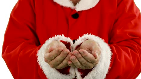 Mid-section-of-santa-claus-with-hands-cupped