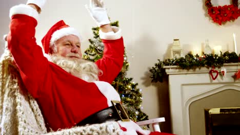 Santa-claus-relaxing-with-hands-behind-head